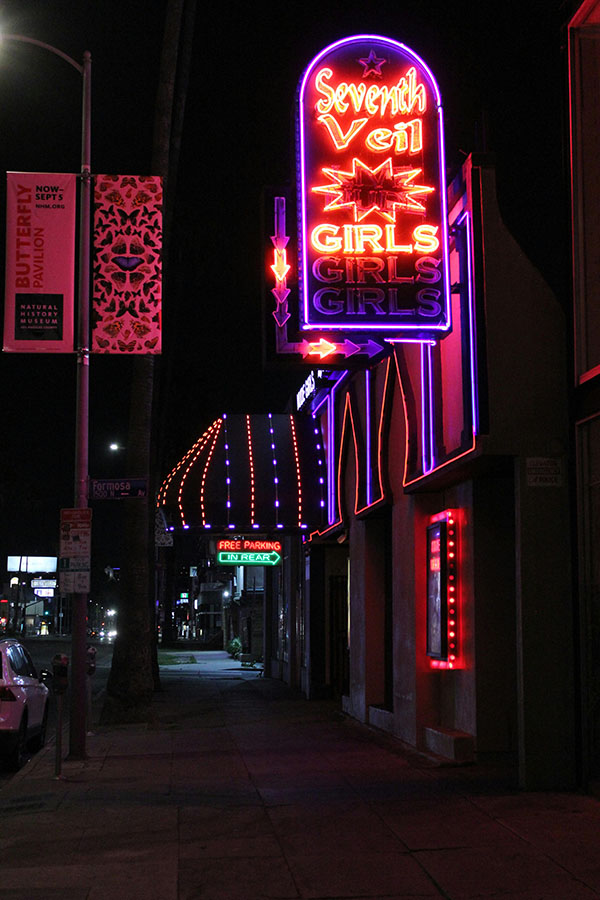 Neon strip club sign