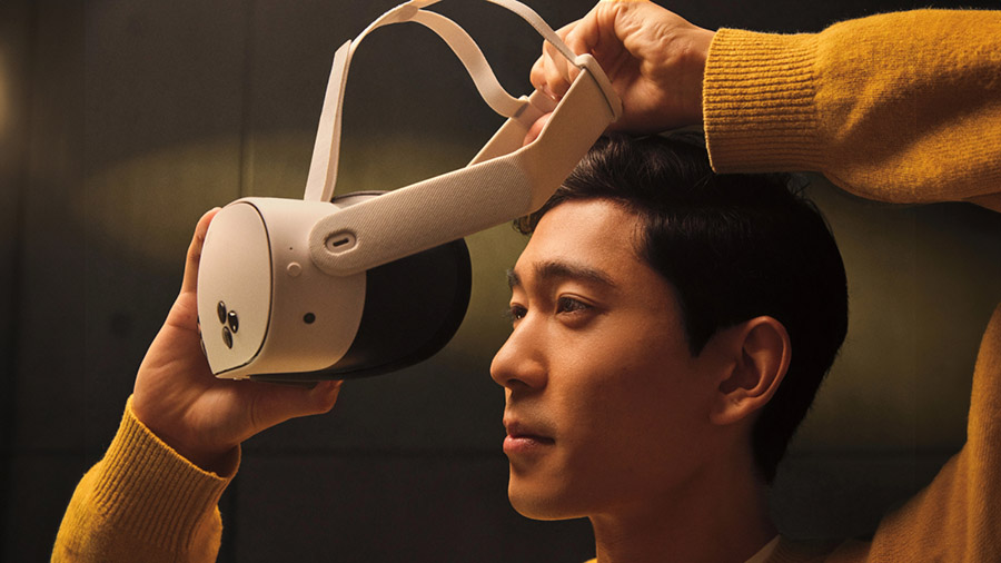 A man putting on the Meta Quest 3S